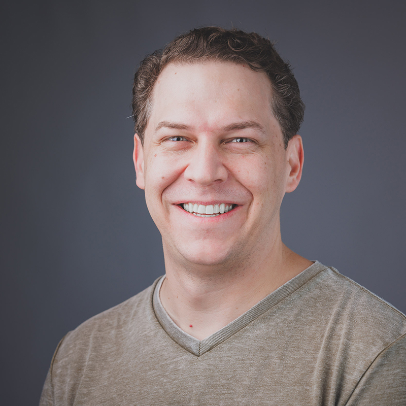Portrait of Evan Arnold, Chief Technology Officer